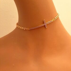 Light Purple Cross on Gold Chain Necklace.